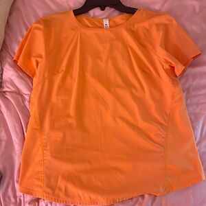 Lululemon neon orange athletic shirt